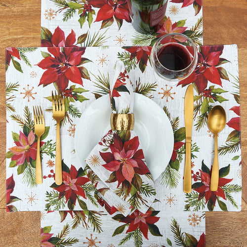 Poinsettia Moments Table Linens table linens displayed as a coordinated tabletop setting.