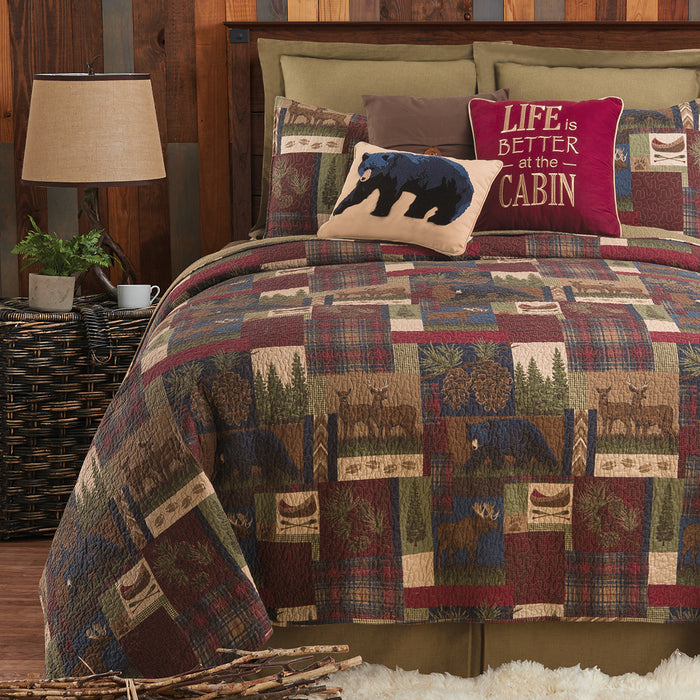 A Rutherford Breeze Quilt Set displayed on a made bed.