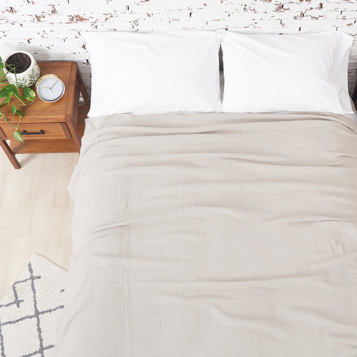 A ryker coverlet displayed on a bed.