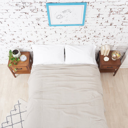 A ryker coverlet displayed on a bed.