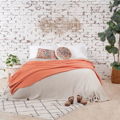 A ryker coverlet displayed on a bed.