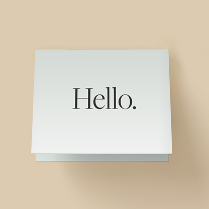 Minimalist card with white background. The word "Hello" in large, elegant black serif type, centered with period.