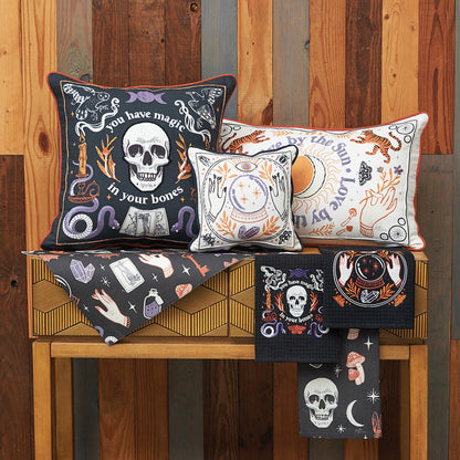 Spooky Magic Table Linens table linens displayed as a coordinated tabletop setting.