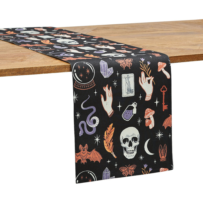 Spooky Magic Table Linens table linens displayed as a coordinated tabletop setting.