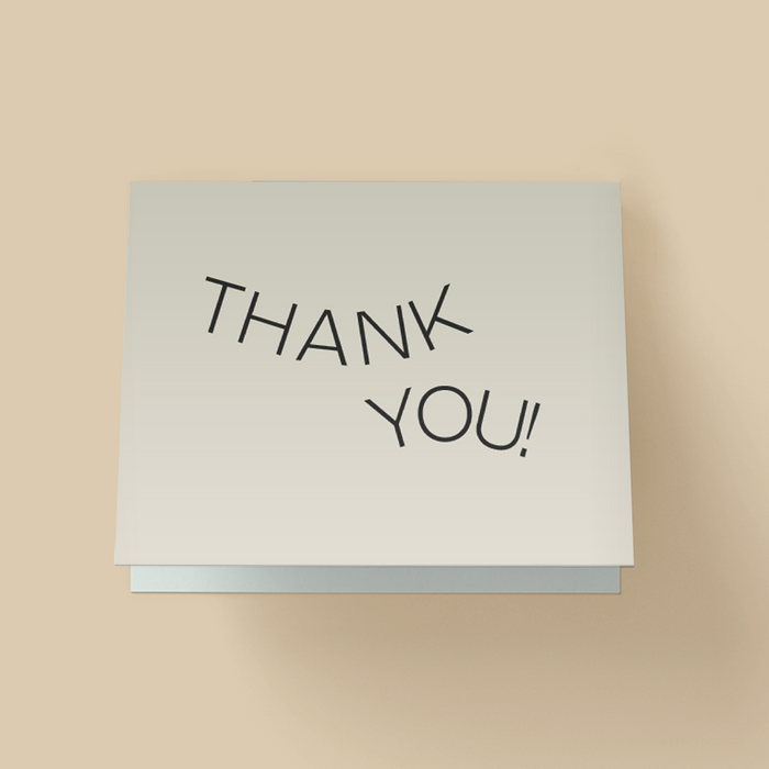 Minimalist thank you card with a white background. The words "THANK YOU" are in thin, black, uppercase sans-serif font, arranged in a slight upward arch in the center with a small plus sign accent in the top right corner.