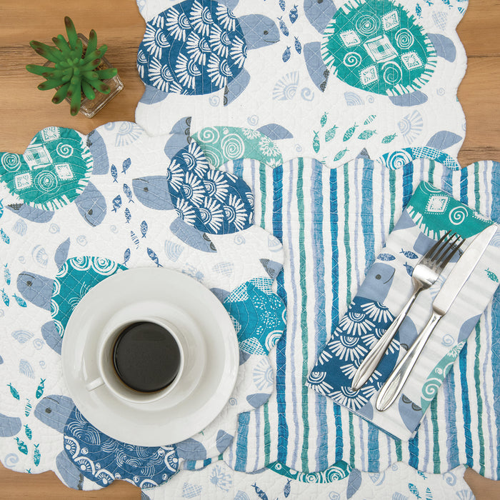 Turtle Bay Table Linens table linens displayed as a coordinated tabletop setting.