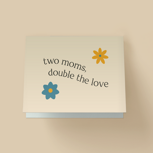 Minimalist  Mother's Day card with off-white background. Black serif text in the center reads 'two moms, double the love' in a curved, arched layout. Two flat illustrated flowers - an orange flower with a blue center in the top right, and a blue flower with an orange center in the bottom left.