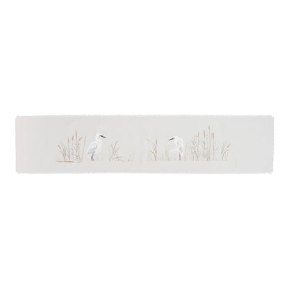 White Egret Table Linens table linens displayed as a coordinated tabletop setting.